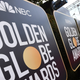 Event signage appears above the red carpet at the 77th annual Golden Globe Awards, Sunday, Jan. 5, 2020.